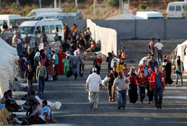 أكثر من 1500 لاجيء سوري يفرون إلى تركيا البحرين صحيفة الوسط البحرينية مملكة البحرين