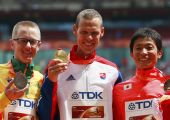 السلوفاكي توت يفوز بذهبية المشي لمسافة 50 كيلومترا ببطولة العالم