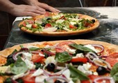 بلدة إيطالية تمنع صنع البيتزا للحد من التلوث