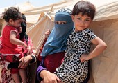 الأمم المتحدة تخشى انتشار شلل الأطفال بين النازحين من الفلوجة