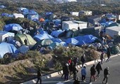 صدامات بين الشرطة ومهاجرين في مخيم كاليه بشمال فرنسا