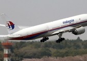 أقارب ضحايا الطائرة الماليزية المفقودة يحتجون على قرار تجميد أعمال البحث