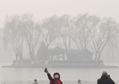بكين تستريح قليلاً من الضباب الدخاني وتوقعات بعودته غداً